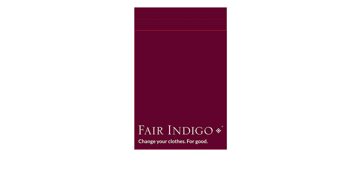 A maroon tag with the text Fair Indigo and the slogan Change your clothes. For good. printed in white at the bottom.